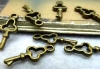 Embel Brass charm 1 7x16mm - 1tk